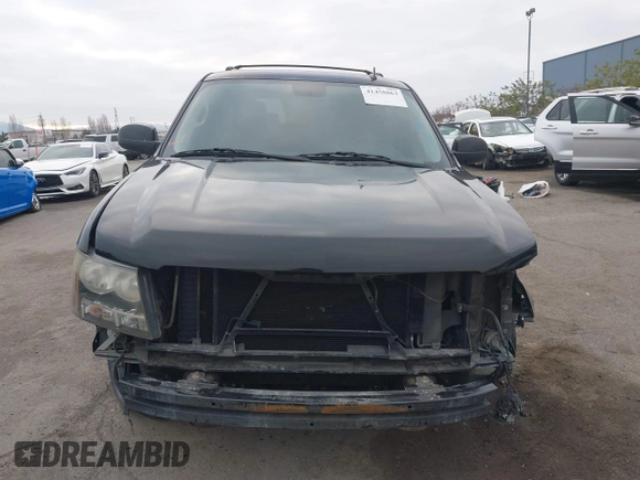 2013 Chevrolet Tahoe LT with VIN 1GNSKBE05DR152825, listed as a IAAI auction lot 41450863 with 157,305 mi miles and . Bid and sale history available at DreamBid. Image 13.