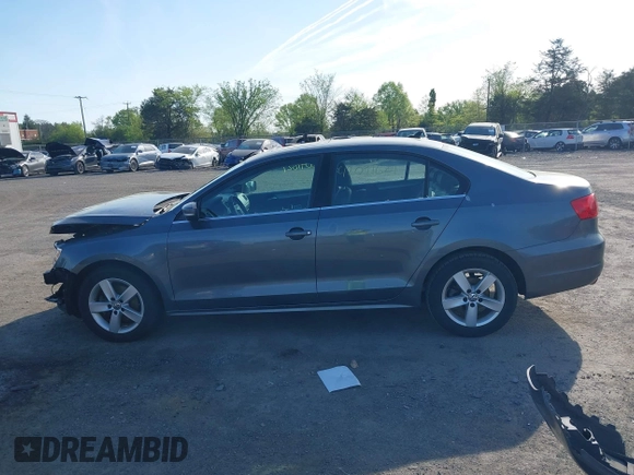 2013 Volkswagen Jetta TDI w/Premium z VIN 3VWLL7AJ6DM291317, wystawiony jako IAAI lot #42091621 z przebiegiem 169 448 mil mil oraz . Historia ofert i sprzedaży dostępna na DreamBid. Obrazek 14.