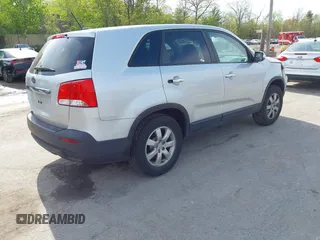 2011 Kia Sorento LX with VIN 5XYKT3A12BG160242, listed as a IAAI auction lot 42220874 with 142,298 mi miles and . Bid and sale history available at carsss.com. Image 4.