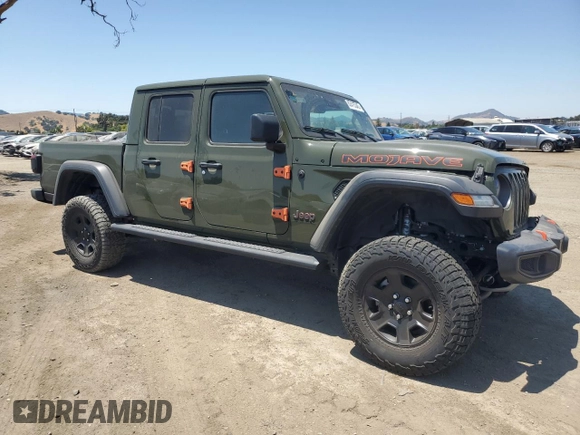 2023 Jeep Gladiator Mojave with VIN 1C6JJTEG9PL559331, listed as a Copart auction lot 62415345 with 22,091 mi miles and Salvage title. Bid and sale history available at DreamBid. Image 4.