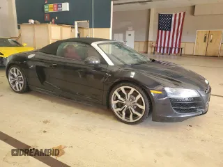 2011 Audi R8 z VIN WUATNAFG7BN002863, wystawiony jako Copart lot #87601245 z przebiegiem Nie podano mil oraz Tytuł czysty. Historia ofert i sprzedaży dostępna na DreamBid. Obrazek 4.
