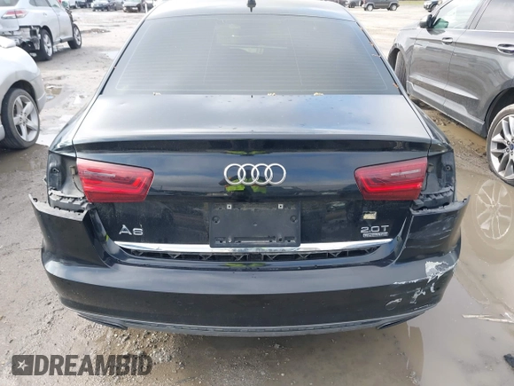2016 Audi A6 Premium Plus z VIN WAUGFAFCXGN121312, wystawiony jako IAAI lot #41923717 z przebiegiem 215 000 mil mil oraz . Historia ofert i sprzedaży dostępna na DreamBid. Obrazek 16.