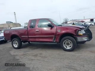 1998 Ford F-150 XL with VIN 1FTDX18W9WKA01690, listed as a IAAI auction lot 41944734 with 176,359 mi miles. Bid and sale history available at carsss.com. Image 13.
