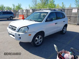 2006 Hyundai Tucson GL with VIN KM8JM72B56U324168, listed as a IAAI auction lot 42146955 with 206,919 mi miles. Bid and sale history available at carsss.com. Image 2.