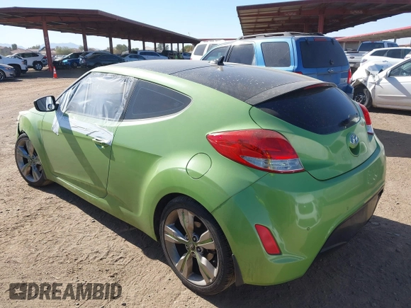 2012 Hyundai Veloster w/Gray Int z VIN KMHTC6AD5CU040673, wystawiony jako IAAI lot #41491429 z przebiegiem Nie podano mil oraz . Historia ofert i sprzedaży dostępna na DreamBid. Obrazek 3.