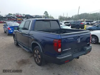2019 Honda Ridgeline RTL-E with VIN 5FPYK3F76KB004584, listed as a IAAI auction lot 41472368 with 49,251 mi miles. Bid and sale history available at carsss.com. Image 3.