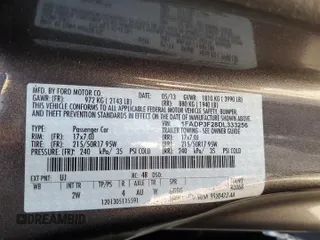 2013 Ford Focus SE with VIN 1FADP3F28DL333256, listed as a Copart auction lot 60438255 with 102,226 mi miles and Clean title. Bid and sale history available at DreamBid. Image 12.
