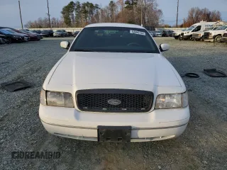 2000 Ford Crown Victoria Police Police Interceptor with VIN 2FAFP71W9YX101655, listed as a Copart auction lot 84666134 with 180,034 mi miles and Salvage Title. Bid and sale history available at carsss.com. Image 5.