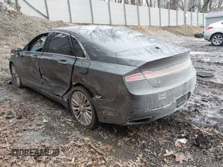 2015 Lincoln MKZ with VIN 3LN6L2J97FR616714, listed as a IAAI auction lot 41664184 with 116,495 mi miles and . Bid and sale history available at DreamBid. Image 3.
