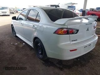 2016 Mitsubishi Lancer ES with VIN JA32U2FU6GU009743, listed as a IAAI auction lot 42088471 with 149,639 mi miles. Bid and sale history available at carsss.com. Image 3.