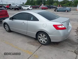 2006 Honda Civic Cpe LX with VIN 2HGFG12606H568106, listed as a IAAI auction lot 41983712 with 196,957 mi miles. Bid and sale history available at carsss.com. Image 3.