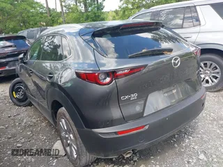 2023 Mazda CX-30 S Premium with VIN 3MVDMBDM2PM526974, listed as a IAAI auction lot 42155416 with 22,428 mi miles and . Bid and sale history available at carsss.com. Image 3.