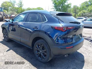 2024 Mazda CX-30 S Select Sport with VIN 3MVDMBBM2RM657781, listed as a IAAI auction lot 42297311 with 13,677 mi miles and . Bid and sale history available at DreamBid. Image 3.