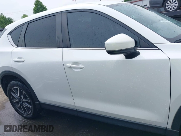 2018 Mazda CX-5 Touring with VIN JM3KFBCMXJ0366008, listed as a IAAI auction lot 42079989 with 153,868 mi miles and . Bid and sale history available at DreamBid. Image 13.