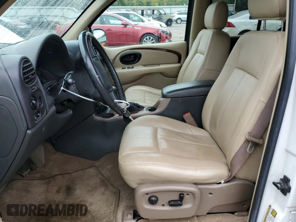2004 Oldsmobile Bravada z VIN 1GHDT13S342224699, wystawiony jako Copart lot #71546144 z przebiegiem 36 549 mil mil oraz Tytuł czysty. Historia ofert i sprzedaży dostępna na DreamBid. Obrazek 7.