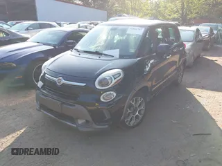 2014 FIAT 500L Trekking with VIN ZFBCFADH5EZ010661, listed as a IAAI auction lot 42861787 with 230,404 mi miles and . Bid and sale history available at DreamBid. Image 2.
