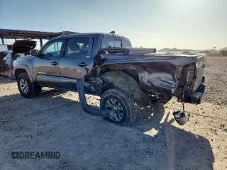 2018 Toyota Tacoma SR5 с VIN 3TMAZ5CN5JM066282, выставлен на аукционе Copart как лот 61197145 с пробегом 85 916 миль миль и Списание • Salvage title. История ставок и продаж доступна на DreamBid. Изображение 2.
