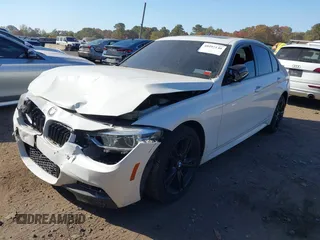 2018 BMW 3 Series 330i xDrive with VIN WBA8D9G55JNU67347, listed as a IAAI auction lot 40597140 with 68,557 mi miles. Bid and sale history available at carsss.com. Image 17.
