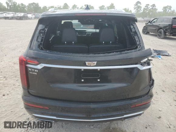 2023 Cadillac XT6 FWD Premium Luxury with VIN 1GYKPCRS6PZ127331, listed as a Copart auction lot 52951105 with 47,796 mi miles and Salvage Title. Bid and sale history available at carsss.com. Image 6.