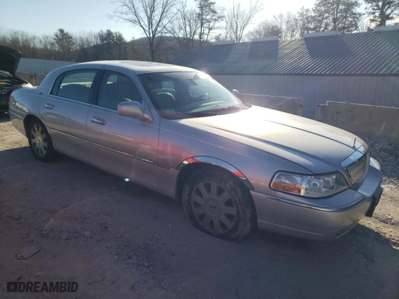2003 Lincoln Town Car Cartier with VIN 1LNHM83W63Y692465, listed as a Copart auction lot 84882984 with 106,405 mi miles and Clean Title. Bid and sale history available at carsss.com. Image 4.