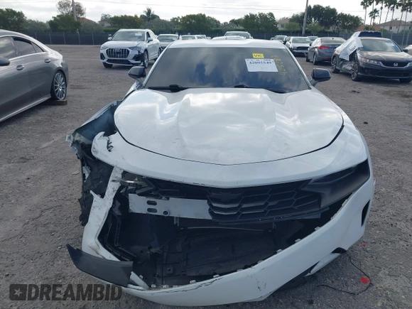 2021 Chevrolet Camaro 1LS z VIN 1G1FB1RX1M0101783, wystawiony jako IAAI lot #42095549 z przebiegiem 61 395 mil mil oraz . Historia ofert i sprzedaży dostępna na DreamBid. Obrazek 12.