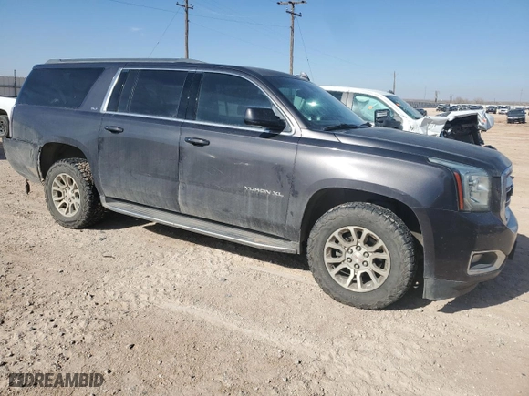 2017 GMC Yukon XL SLT with VIN 1GKS2GKC9HR323915, listed as a Copart auction lot 87661425 with 101,630 mi miles and Salvage Title. Bid and sale history available at carsss.com. Image 4.