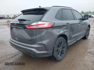 2023 Ford Edge SE z VIN 2FMPK4G95PBA41278, wystawiony jako IAAI lot #41964995 z przebiegiem 21 079 mil mil oraz . Historia ofert i sprzedaży dostępna na DreamBid. Obrazek 4.
