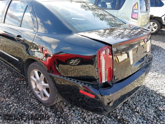2005 Cadillac STS with VIN 1G6DW677250190268, listed as a IAAI auction lot 41702798 with 142,427 mi miles. Bid and sale history available at carsss.com. Image 6.