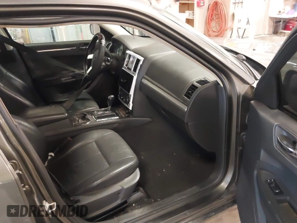 2010 Chrysler 300 Touring with VIN 2C3CA5CV9AH101800, listed as a IAAI auction lot 42015640 with 128,457 mi miles and . Bid and sale history available at DreamBid. Image 5.