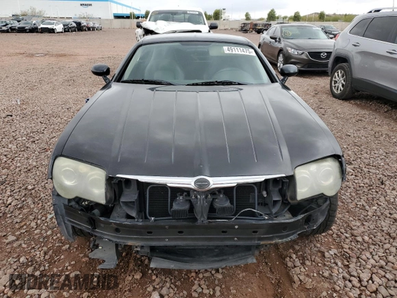 2004 Chrysler Crossfire z VIN 1C3AN69LX4X023972, wystawiony jako Copart lot #49111475 z przebiegiem 208 710 mil mil oraz Szkoda całkowita • Salvage title. Historia ofert i sprzedaży dostępna na DreamBid. Obrazek 5.