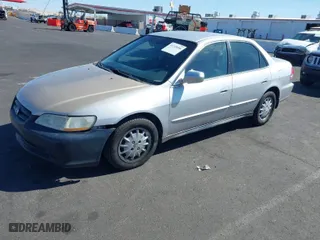 2001 Honda Accord Sdn EX with VIN 1HGCG56501A025325, listed as a IAAI auction lot 41718506 with 209,073 mi miles. Bid and sale history available at carsss.com. Image 2.