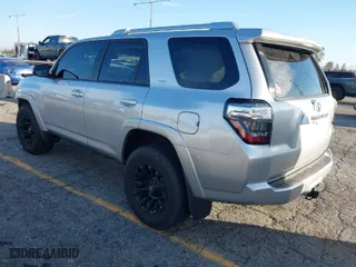 2015 Toyota 4Runner Limited with VIN JTEBU5JR6F5218586, listed as a IAAI auction lot 41594711 with 164,713 mi miles. Bid and sale history available at carsss.com. Image 3.