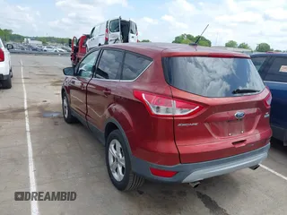2014 Ford Escape SE with VIN 1FMCU0GX4EUD02407, listed as a IAAI auction lot 42156731 with 114,117 mi miles. Bid and sale history available at carsss.com. Image 3.