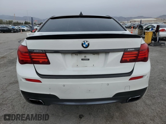 2013 BMW 7 Series 740i with VIN WBAYA6C55DC995290, listed as a Copart auction lot 82022284 with 128,882 mi miles and Salvage Title. Bid and sale history available at carsss.com. Image 6.