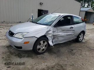 2006 Ford Focus S with VIN 1FAFP31N66W141247, listed as a Copart auction lot 57600545 with 156,449 mi miles and Salvage title. Bid and sale history available at DreamBid. Image 1.