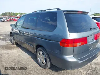 2001 Honda Odyssey EX z VIN 2HKRL18601H532141, wystawiony jako IAAI lot #41981052 z przebiegiem 126 931 mil mil oraz . Historia ofert i sprzedaży dostępna na DreamBid. Obrazek 3.