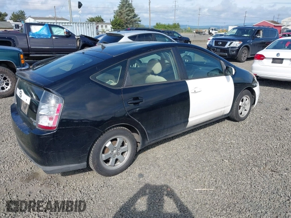 2005 Toyota Prius z VIN JTDKB20U450126080, wystawiony jako IAAI lot #42215698 z przebiegiem Nie podano mil oraz . Historia ofert i sprzedaży dostępna na DreamBid. Obrazek 4.