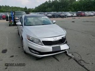 2013 Kia Optima EX z VIN 5XXGN4A79DG217554, wystawiony jako Copart lot #59667065 z przebiegiem 102 482 mil mil oraz Szkoda całkowita • Salvage title. Historia ofert i sprzedaży dostępna na DreamBid. Obrazek 13.