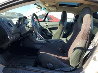 2009 Mitsubishi Eclipse GS with VIN 4A3AK24F19E013670, listed as a Copart auction lot 76370004 with 132,794 mi miles and Salvage Title. Bid and sale history available at carsss.com. Image 7.