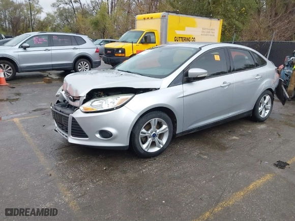 2014 Ford Focus SE with VIN 1FADP3F20EL406508, listed as a IAAI auction lot 40809098 with 89,731 mi miles. Bid and sale history available at carsss.com. Image 2.