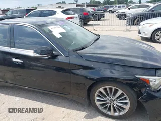 2020 Infiniti Q50 Sport z VIN JN1EV7AP1LM201269, wystawiony jako IAAI lot #42358333 z przebiegiem 69 368 mil mil oraz . Historia ofert i sprzedaży dostępna na DreamBid. Obrazek 13.