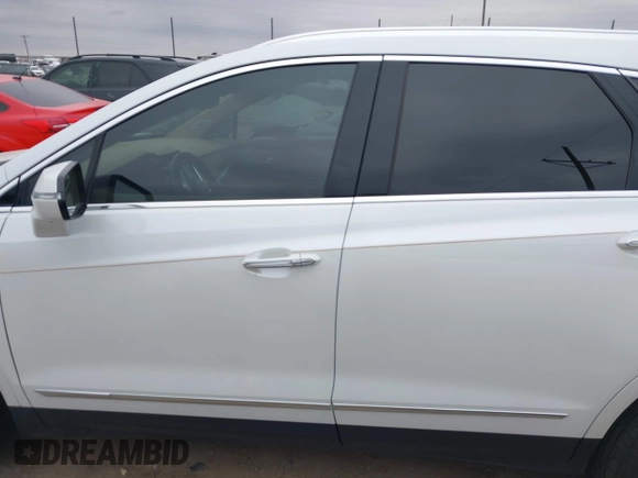2024 Cadillac XT5 Premium Luxury AWD with VIN 1GYKNERSXRZ707816, listed as a IAAI auction lot 41749596 with 8,701 mi miles. Bid and sale history available at carsss.com. Image 14.