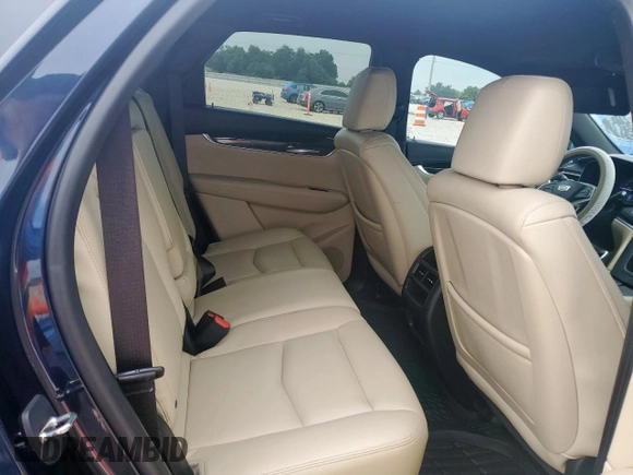 2017 Cadillac XT5 FWD with VIN 1GYKNARS8HZ162612, listed as a Copart auction lot 58727265 with 100,494 mi miles and Clean title. Bid and sale history available at DreamBid. Image 11.