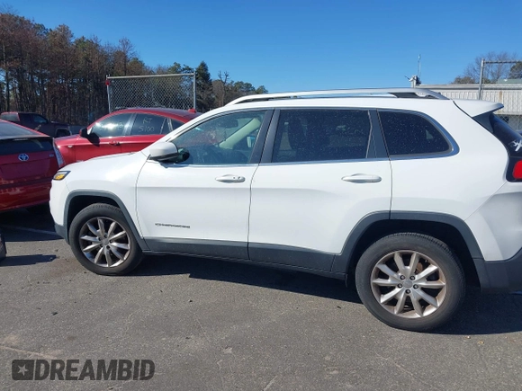 2015 Jeep Cherokee Limited with VIN 1C4PJMDS7FW688762, listed as a IAAI auction lot 41709877 with 154,499 mi miles. Bid and sale history available at carsss.com. Image 14.