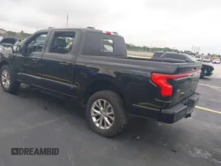 2023 Ford F-150 Lightning Pro with VIN 1FT6W1EV3PWG08587, listed as a IAAI auction lot 42418036 with Not provided miles and . Bid and sale history available at DreamBid. Image 3.