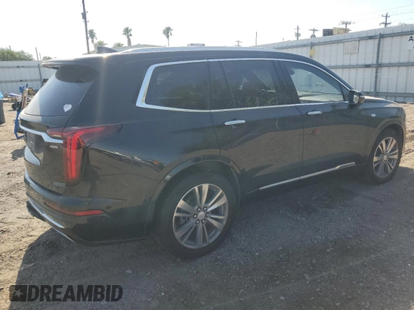 2021 Cadillac XT6 Premium Luxury with VIN 1GYKPCRS4MZ199110, listed as a Copart auction lot 51798905 with 66,486 mi miles and Salvage Title. Bid and sale history available at DreamBid. Image 3.