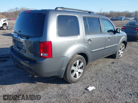 2012 Honda Pilot Touring with VIN 5FNYF3H9XCB042090, listed as a IAAI auction lot 41751359 with 140,424 mi miles and . Bid and sale history available at carsss.com. Image 4.