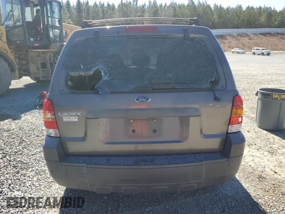 2005 Ford Escape XLS Value с VIN 1FMYU92Z75KB68457, выставлен на аукционе Copart как лот 46427005 с пробегом 144 278 миль миль и Списание • Salvage title. История ставок и продаж доступна на DreamBid. Изображение 6.