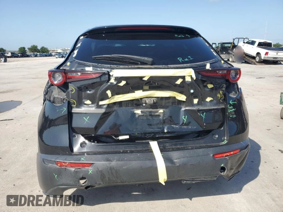 2021 Mazda CX-30 Select z VIN 3MVDMABL3MM254998, wystawiony jako Copart lot #61411935 z przebiegiem 60 733 mil mil oraz Szkoda całkowita • Salvage title. Historia ofert i sprzedaży dostępna na DreamBid. Obrazek 6.