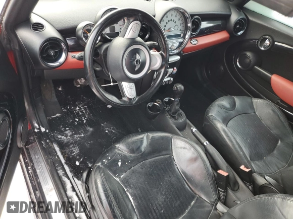 2010 MINI Convertible with VIN WMWMR3C57ATU97979, listed as a Copart auction lot 45903855 with 154,614 mi miles and Salvage Title. Bid and sale history available at DreamBid. Image 8.